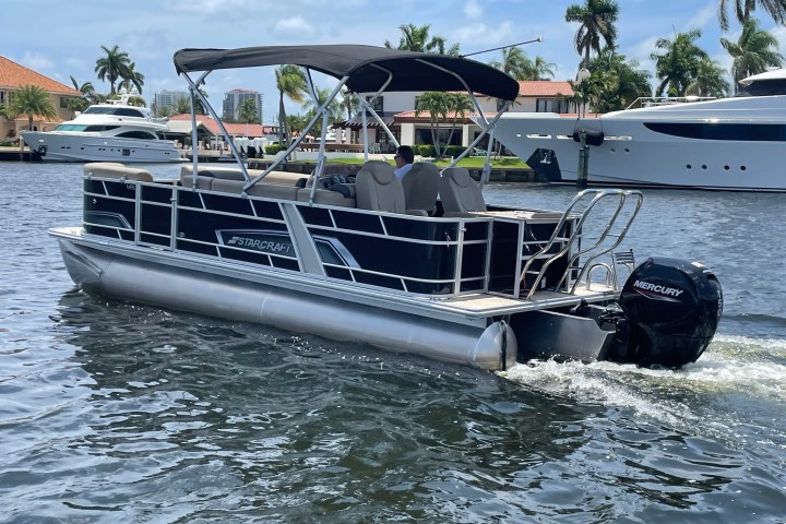 a small boat in a large body of water